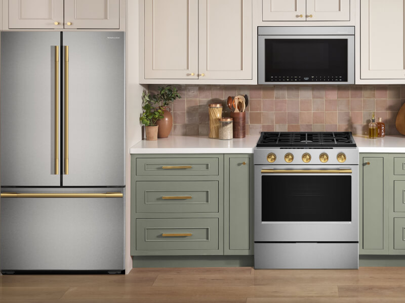 A stainless KitchenAid® French door refrigerator in a modern kitchen