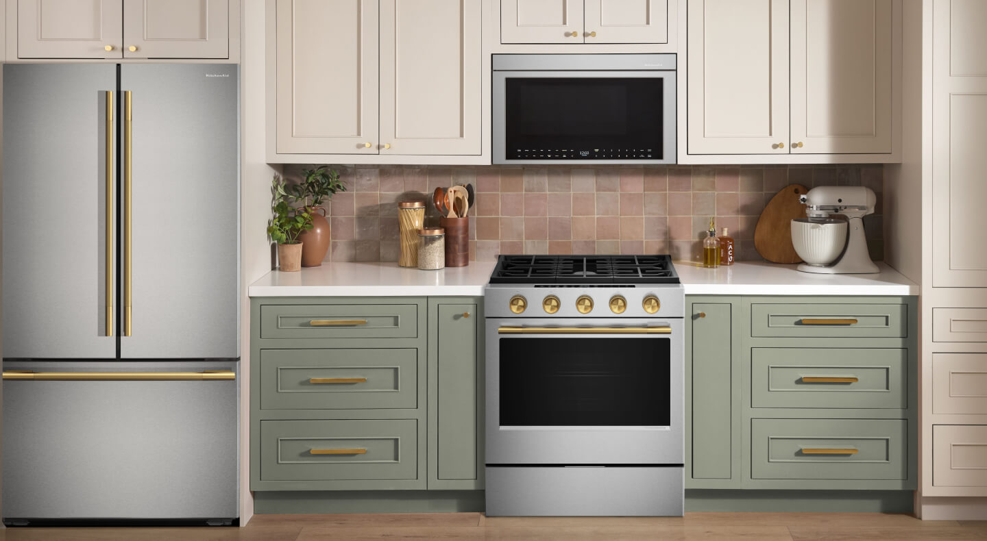 A stainless KitchenAid® French door refrigerator in a modern kitchen