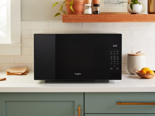KitchenAid® countertop microwave on a white counter