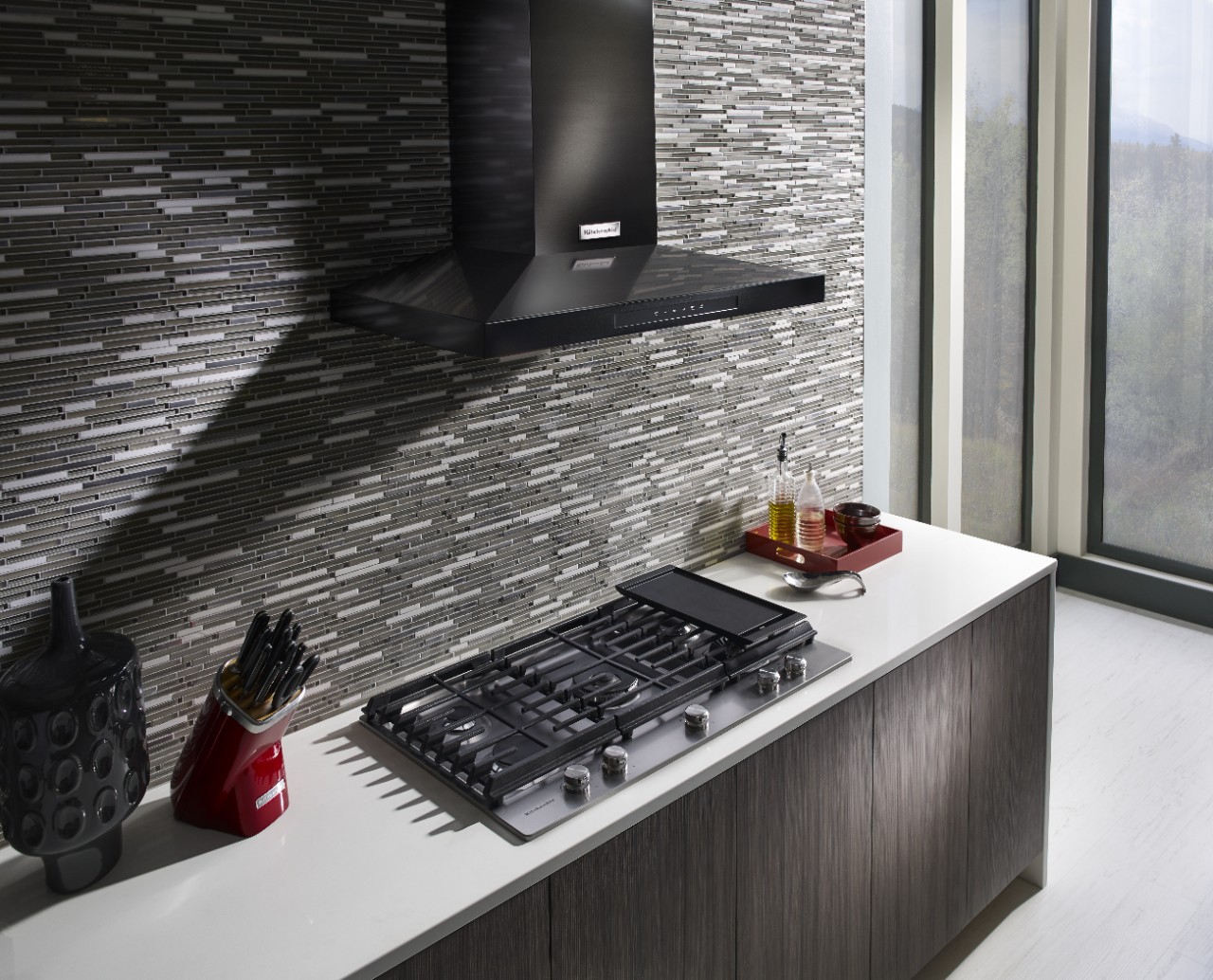 Complete your kitchen with a black stainless steel range hood from KitchenAid. Complete your kitchen with a black stainless steel range hood from KitchenAid.