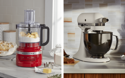 Countertop with KitchenAid® food processor containing flour and butter next to a loaf of bread.