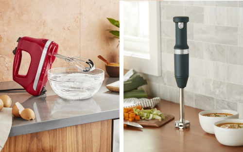 Red KitchenAid® hand mixer on countertop next to black KitchenAid® immersion blender 