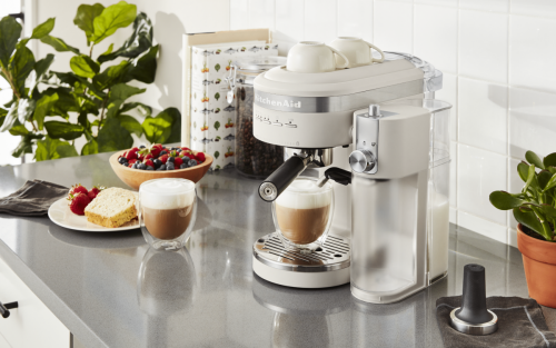 Latte sitting in White KitchenAid® Espresso Machine with Automatic Milk Frother Attachment