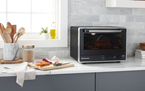 A black KitchenAid® air fryer on a countertop