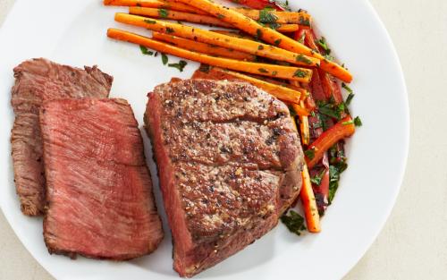 Steak on a plate with vegetables