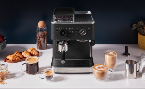 KitchenAid® Semi Automatic Espresso Machine next to a variety of espresso beverages