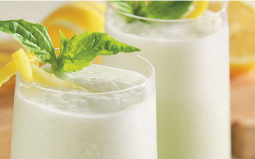 Frozen lemonade with candied citrus and fresh basil