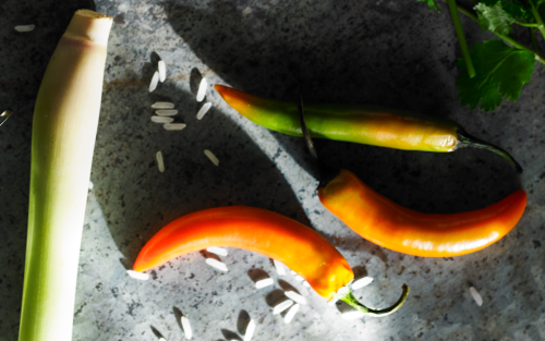 Hot peppers on gray surface