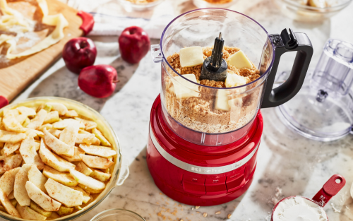 A KitchenAid® food processor with apple pie ingredients