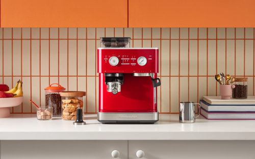 Red KitchenAid® semi-automatic espresso machine on a kitchen counter