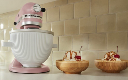 Pink KitchenAid® stand mixer next to two ice cream sundaes