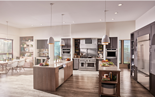 Modern open concept kitchen with stainless steel appliances