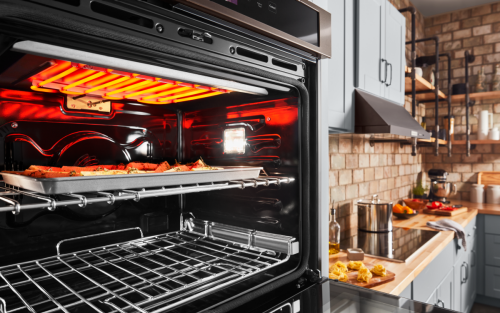 An oven with a tray of food inside of it