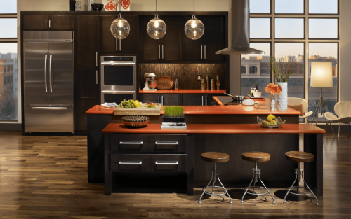 Open concept kitchen with kitchen island and counter stools