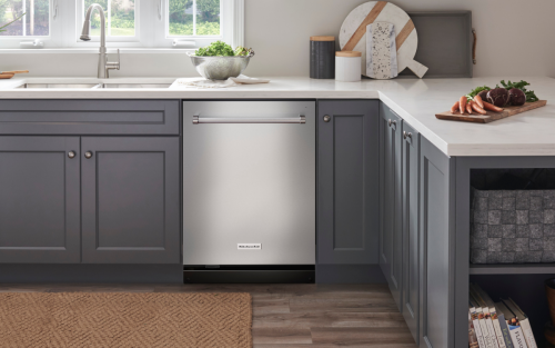 A stainless steel KitchenAid® dishwasher in a modern kitchen