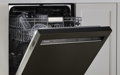 A closeup of the inside of a KitchenAid® dishwasher.