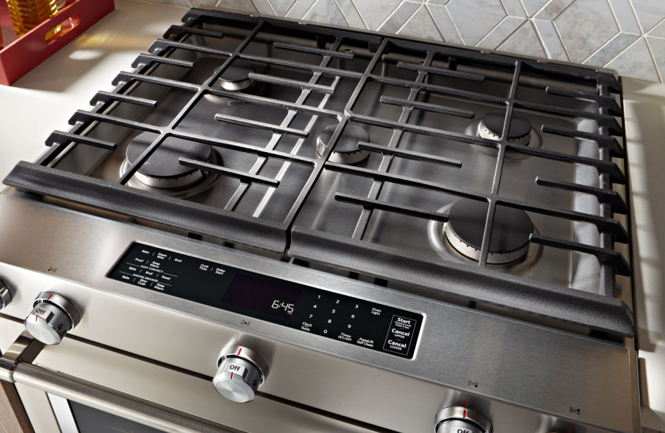 A 5-burner gas stovetop shown from overhead