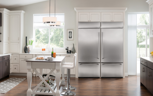 Kitchen with KitchenAid® stainless steel appliances and white cabinets