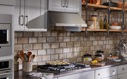 KitchenAid® range hood in a gray kitchen