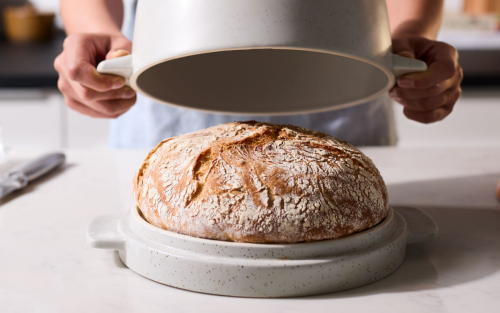 Fresh loaf of bread on a KitchenAid® Bread Bowl Lid