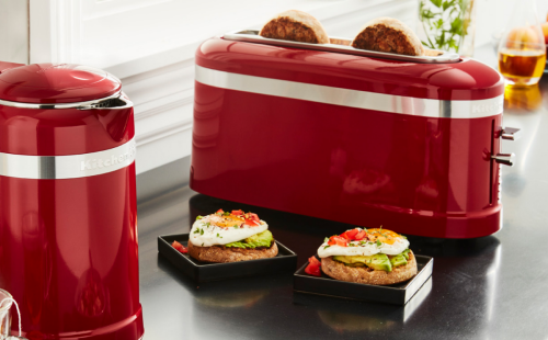 Red KitchenAid® kettle next to a breakfast spread