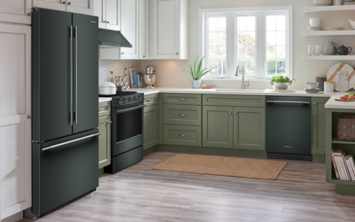 A kitchen with a suite of KitchenAid® appliances in the shade of Juniper