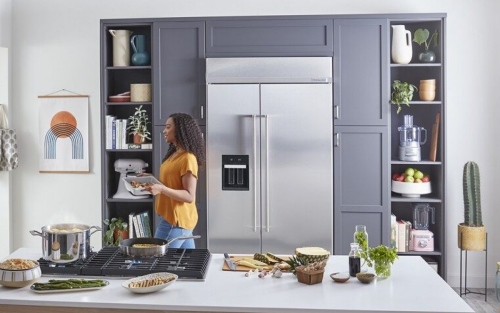 Person cooking a meal in a modern kitchen