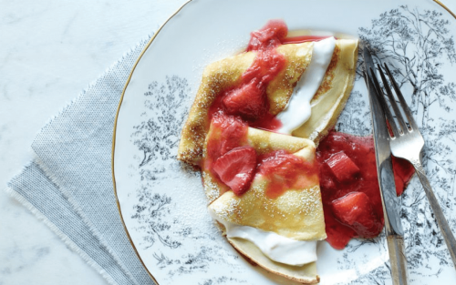 Strawberry crepes on a plate