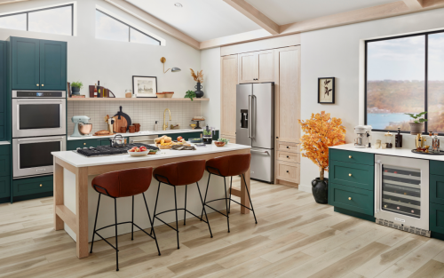 A trendy, stylish kitchen with teal cabinetry and a suite of KitchenAid® appliances.