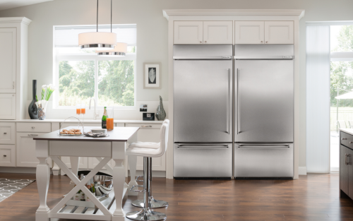 Stainless steel KitchenAid® french door refrigerator built into a modern kitchen