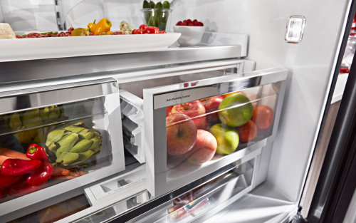 Close-up of fruit and vegetables in a humidity controlled refrigerator drawer