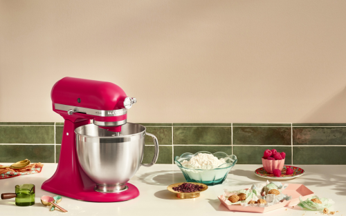 A red KitchenAid® stand mixer used to make desserts