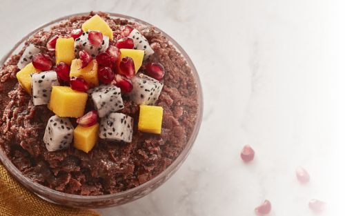 Baobing topped with diced mangoes and dragon fruit