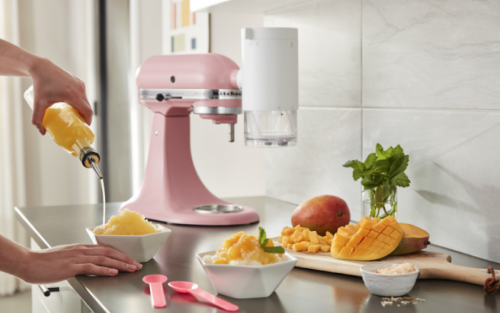 Mango Hawaiian shave ice next to a pink KitchenAid® stand mixer