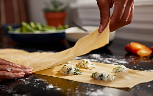 Close up of person making ravioli 