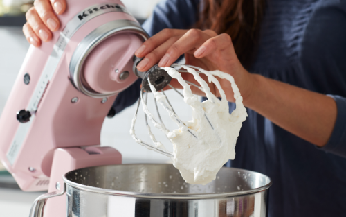 Pink KitchenAid® stand mixer making homemade whipped cream