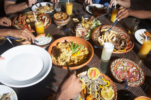 A large table featuring a variety of delicious dishes.