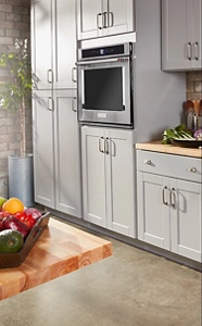 A commercial-style gas range in a bright kitchen setting