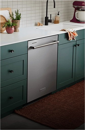 A loaded three rack dishwasher