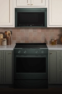 A KitchenAid® Over-the-Range microwave installed above a sleek, slide-in range