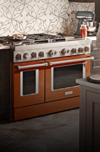 A scorched orange KitchenAid® commercial-style range