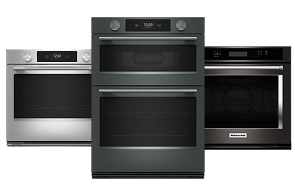 Three KitchenAid wall ovens.