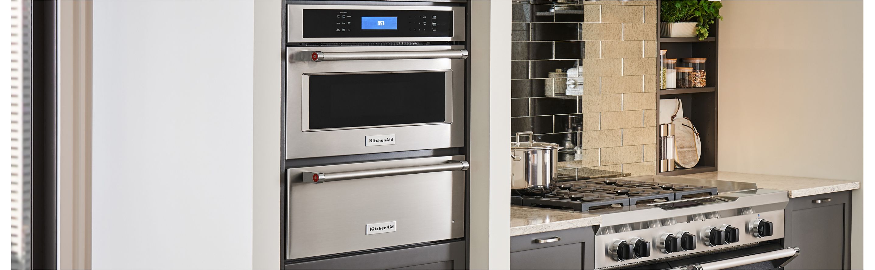View of wall oven and warming drawer