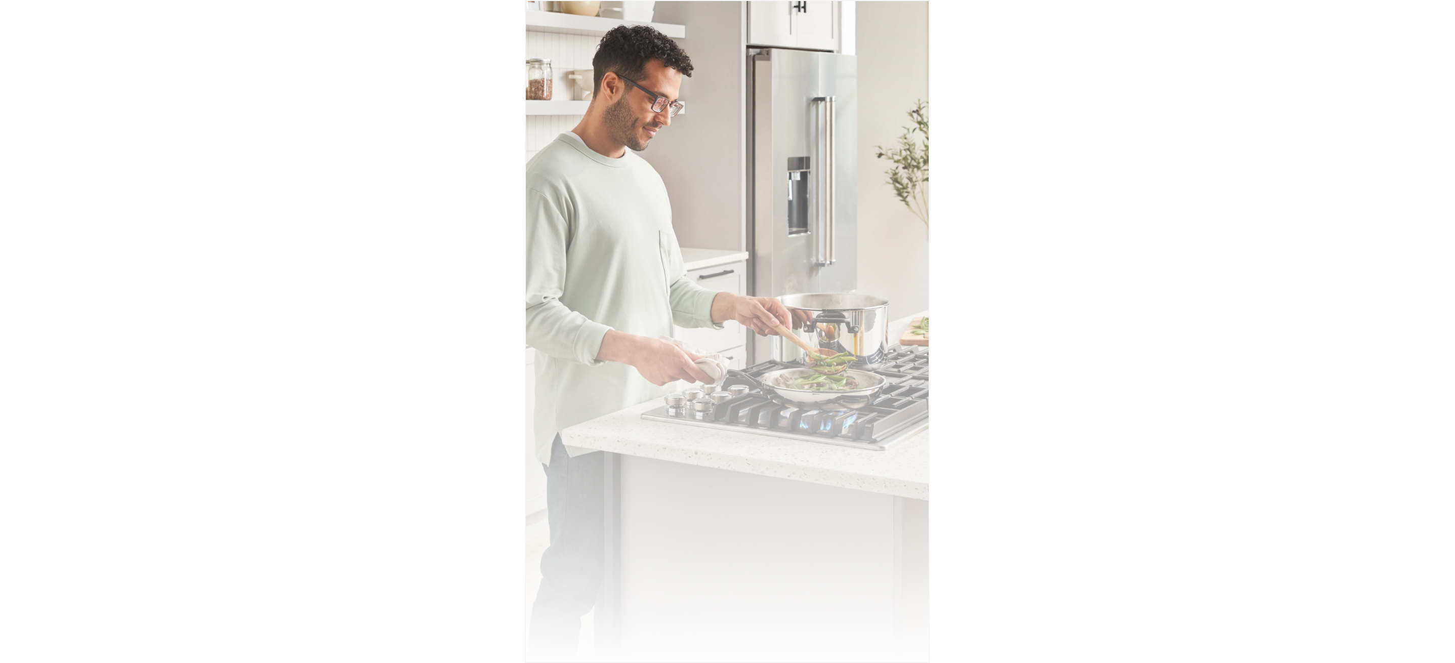 Man cooking on a gas cooktop 