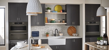A Black Ore wall oven in a contemporary kitchen.