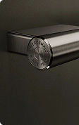 A close up of the handle on a Black Ore oven.