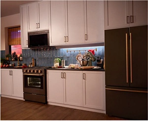 A suite of Juniper appliances in a kitchen.
