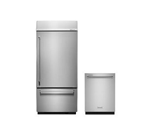 A stainless steel built-in bottom freezer refrigerator next to a stainless steel dishwasher