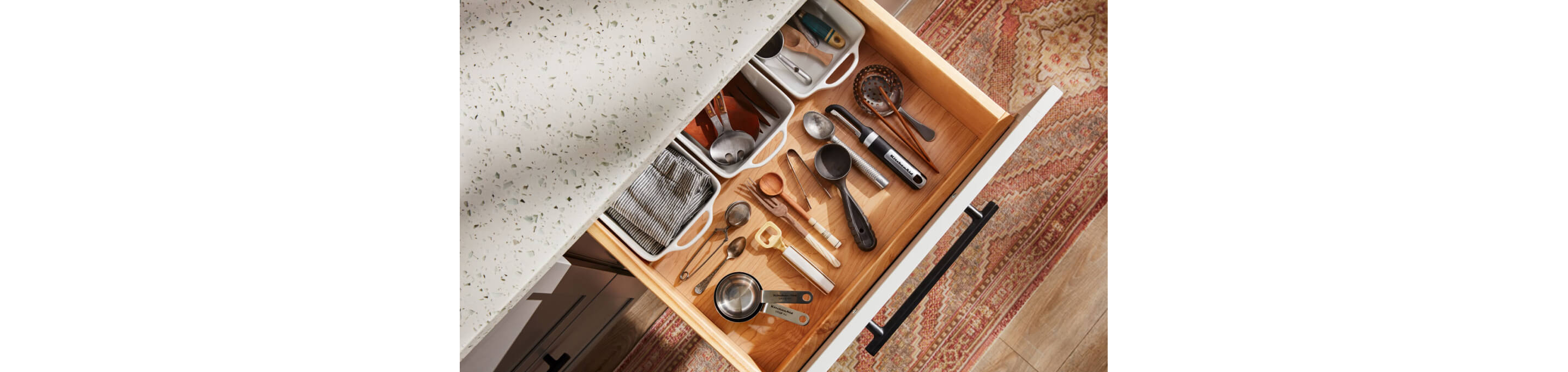 The interior of a utensil drawer.