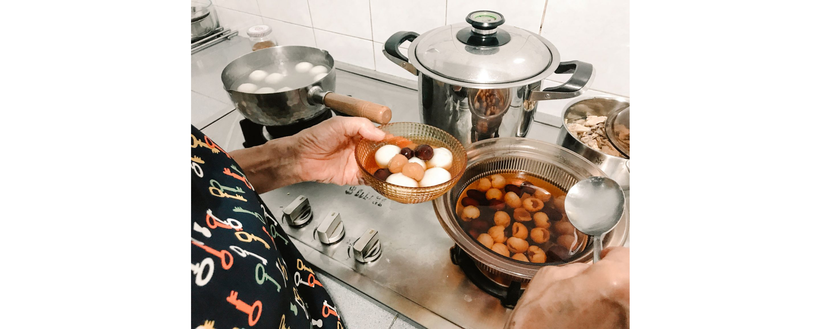 A mom serving food from a pot into a bowl.